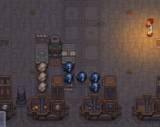 Graveyard Keeper 2 の工場で動いている鉄の地金のライン。左の鉱石置き場からまっすぐ上へ、右の石炭置き場からは左へ曲がってから上へベルトが伸び、鍛冶場の下の入口に入っている